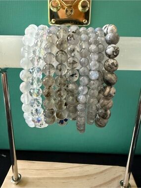 Variety of white and gray authentic crystal bead bracelets